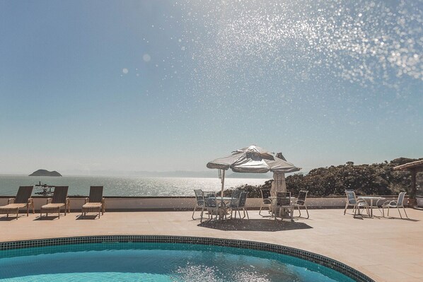 Outdoor pool, open 9:00 AM to 8:00 PM, pool umbrellas, sun loungers