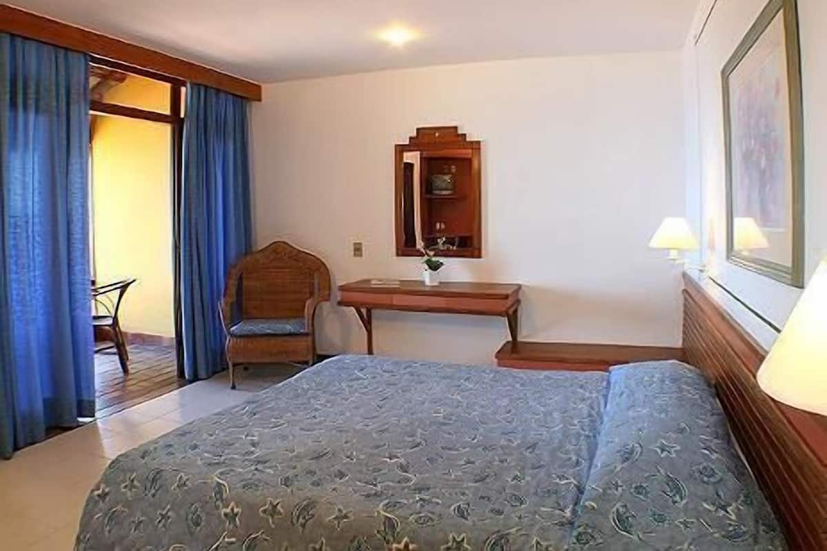 Minibar, Zimmersafe, Verdunkelungsvorhänge, Bettwäsche