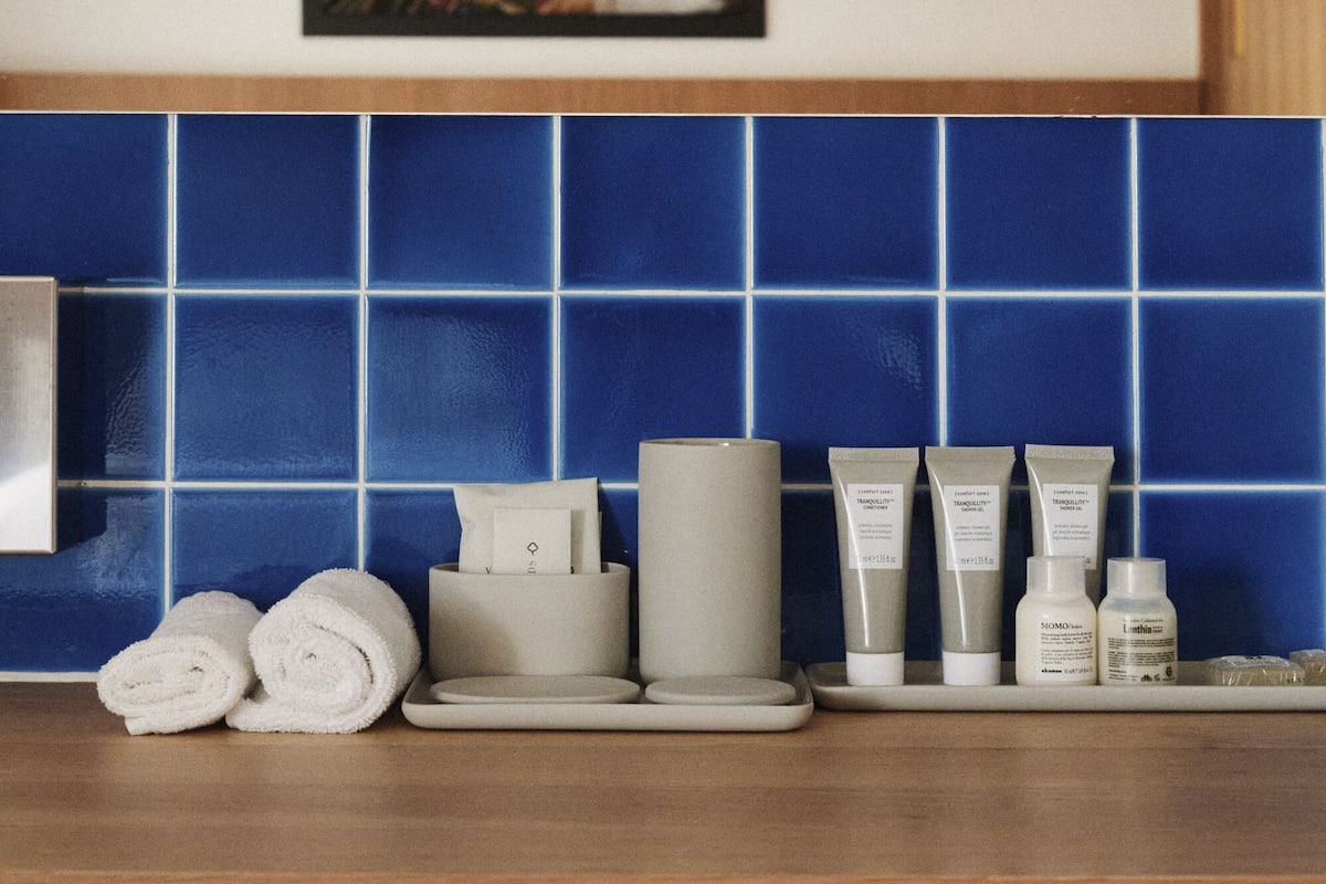 suite, balcony, garden view | bathroom | designer toiletries, hair dryer, slippers, bidet