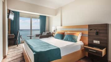 Standard Room, Sea View | Minibar, in-room safe, iron/ironing board, free WiFi