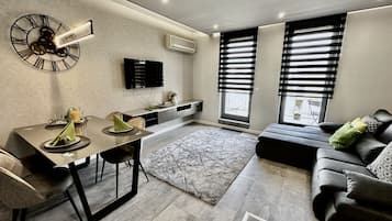 Appartement une chambre à coucher pour 4 personnes | Coin séjour | Télévision