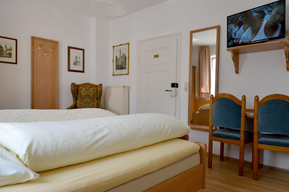Premium bedding, down duvets, in-room safe, individually decorated