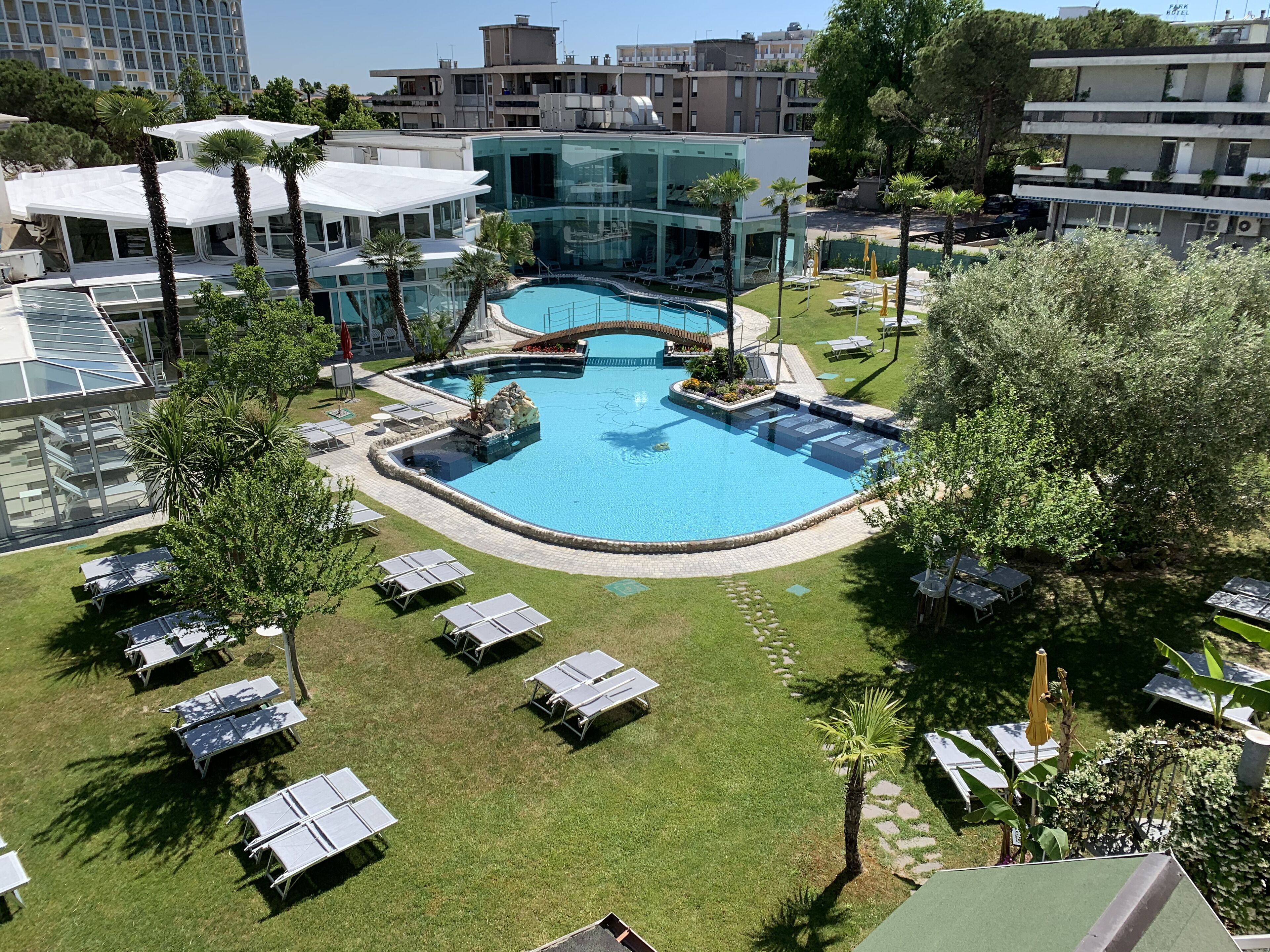 Indoor pool, 2 outdoor pools, open 8:00 AM to 11:30 PM, pool umbrellas