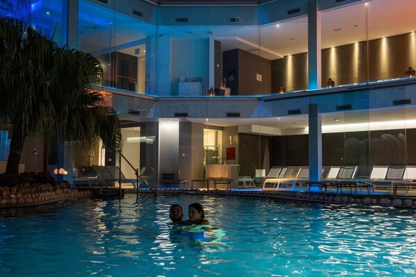 Indoor pool, 2 outdoor pools, open 8:00 AM to 11:30 PM, pool umbrellas