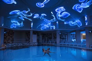 Indoor pool, 2 outdoor pools, open 8:00 AM to 11:30 PM, pool umbrellas