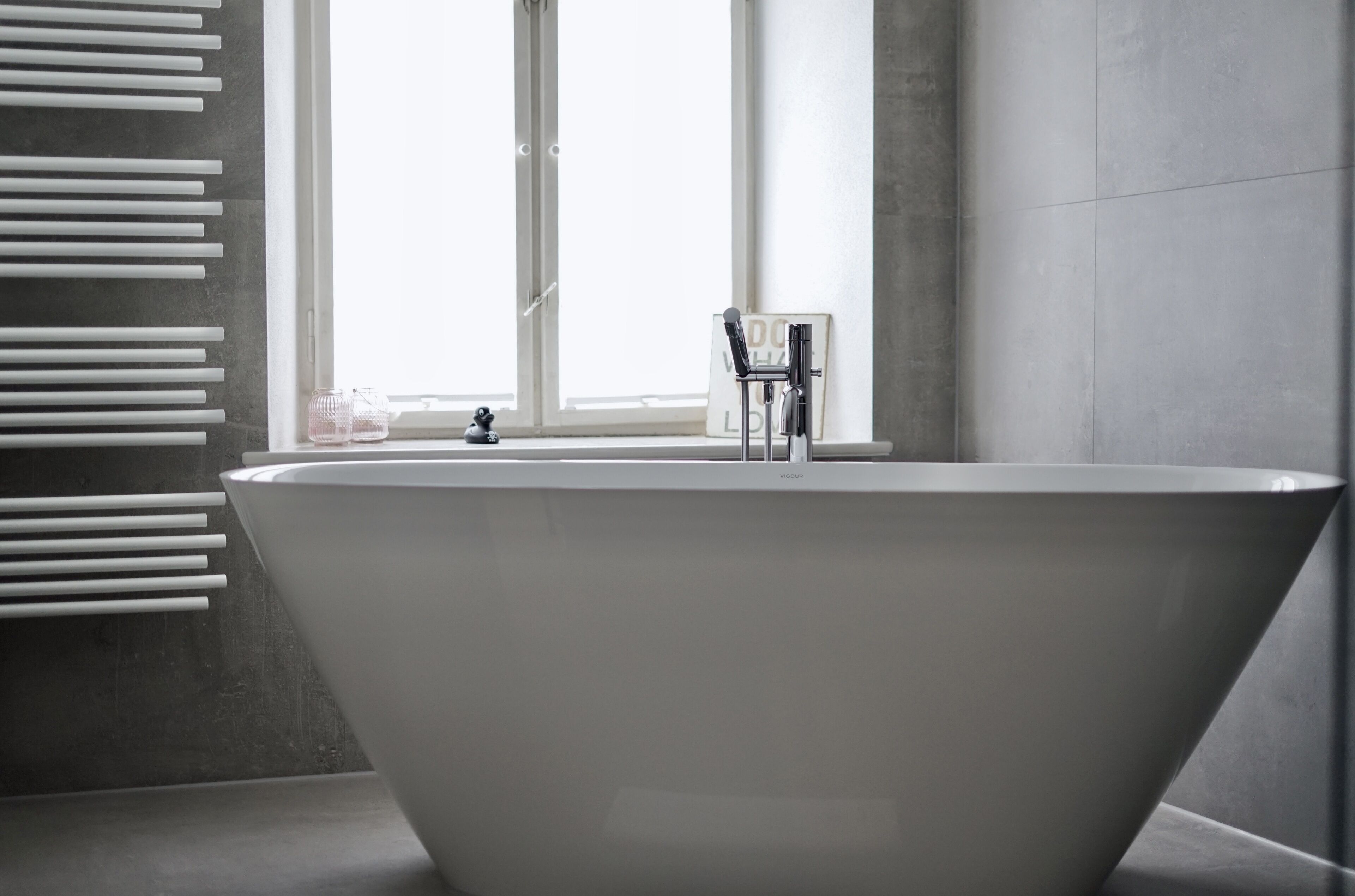 deluxe studio | bathroom | hair dryer, towels, soap, shampoo