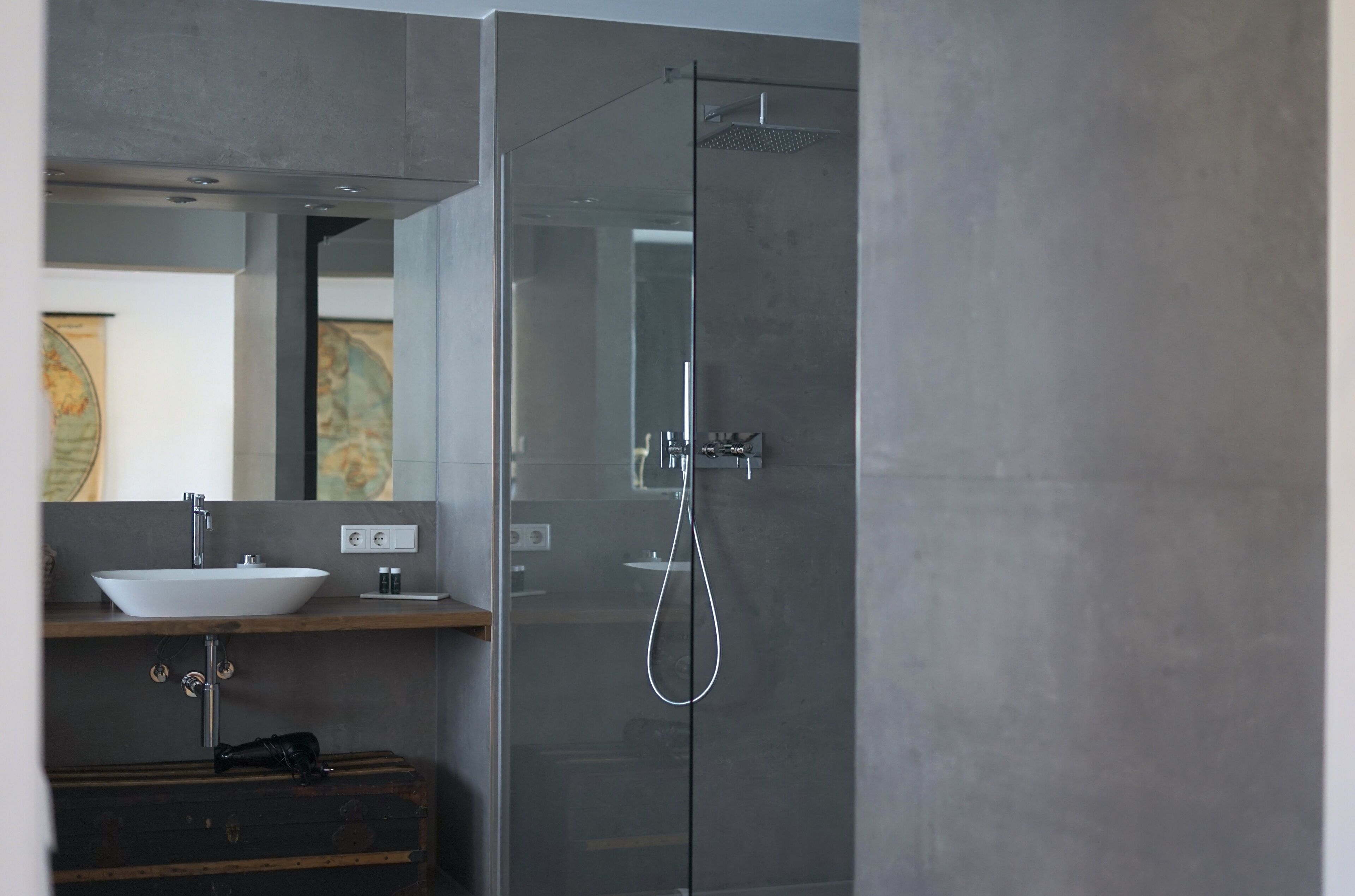 deluxe studio | bathroom | hair dryer, towels, soap, shampoo