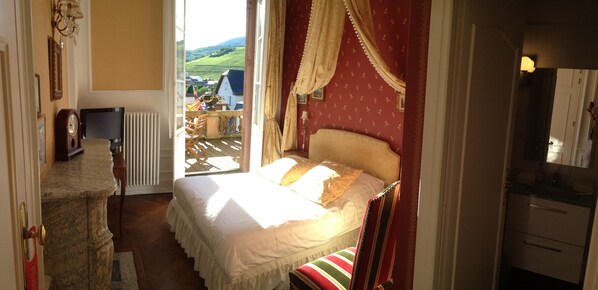 Premium bedding, desk, laptop workspace, soundproofing