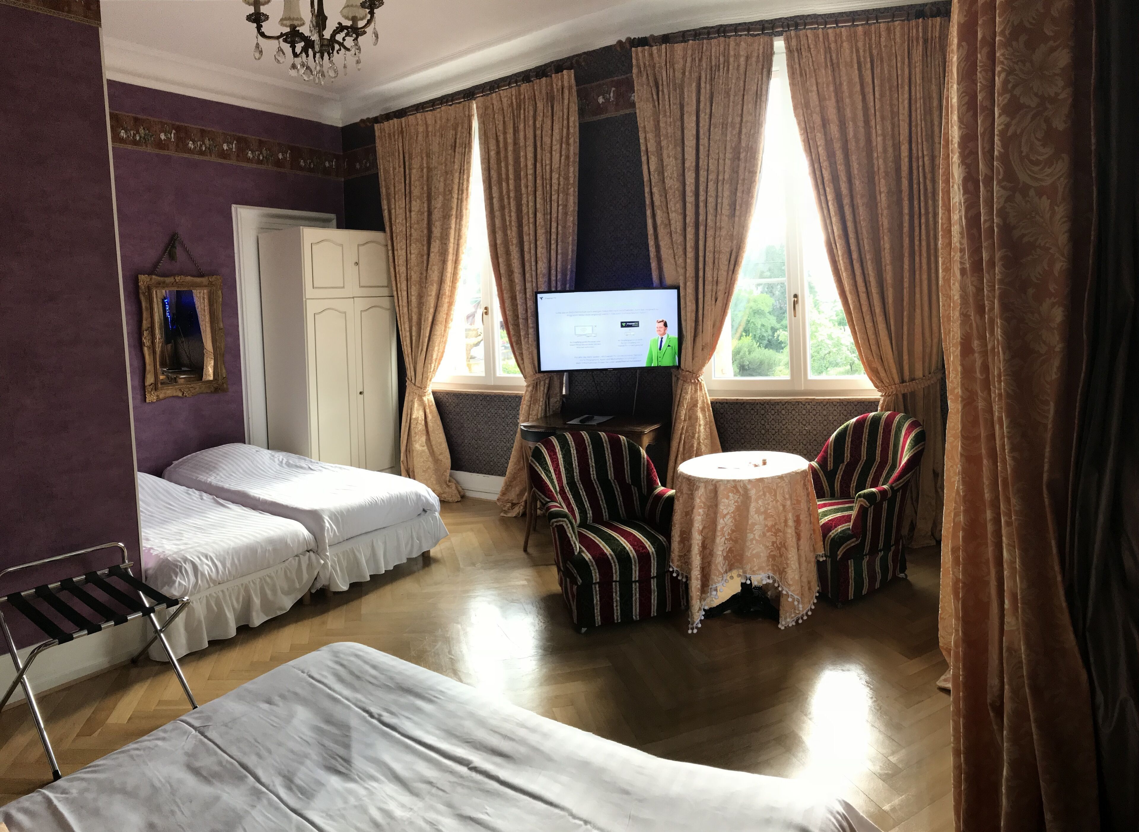 Premium bedding, desk, laptop workspace, soundproofing