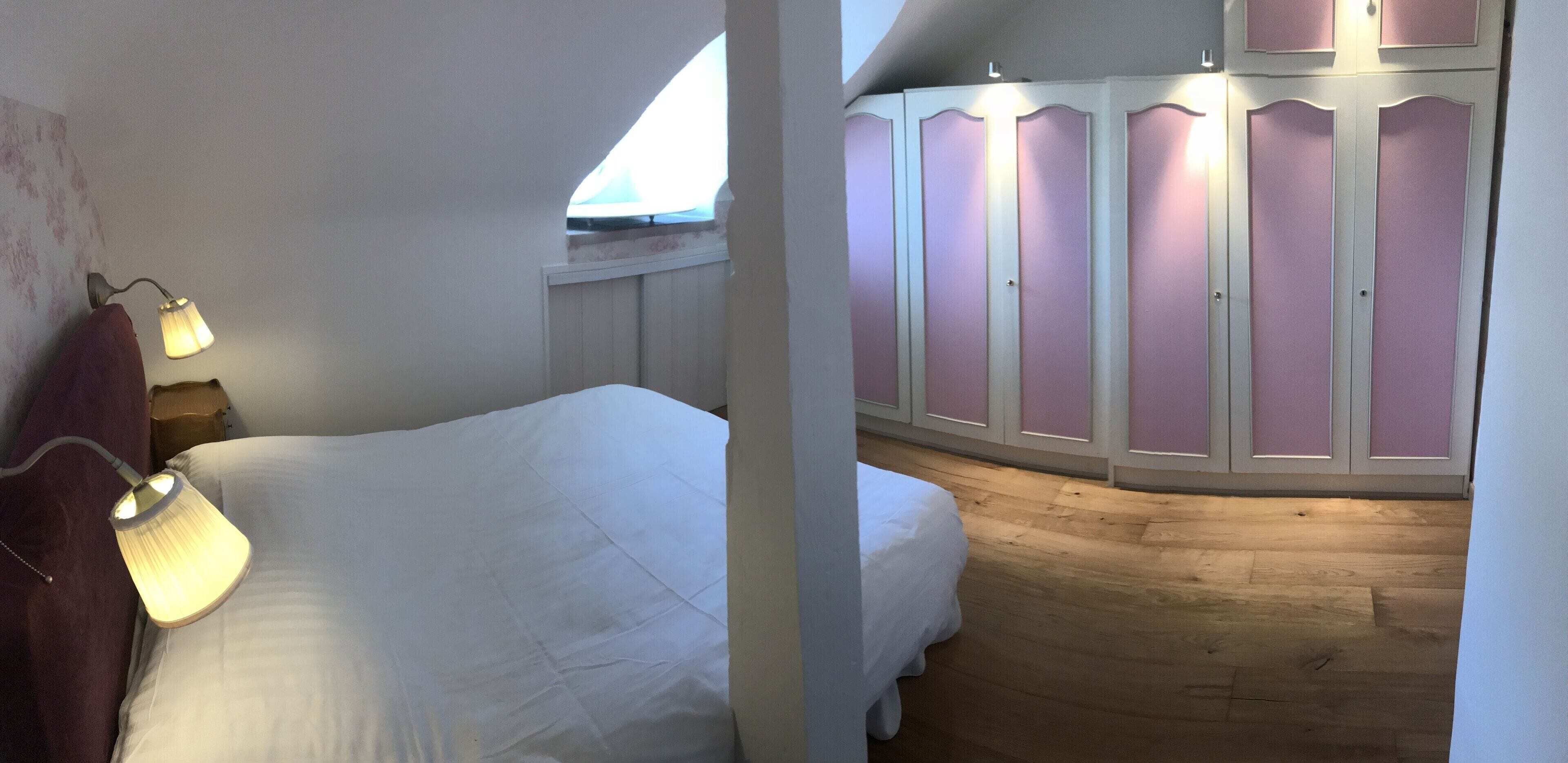 Premium bedding, desk, laptop workspace, soundproofing