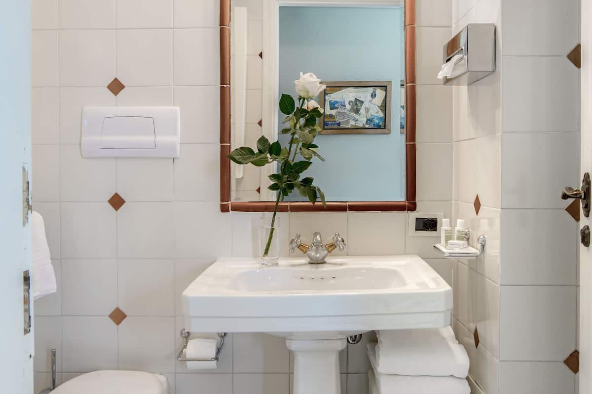 free toiletries, hair dryer, slippers, bidet