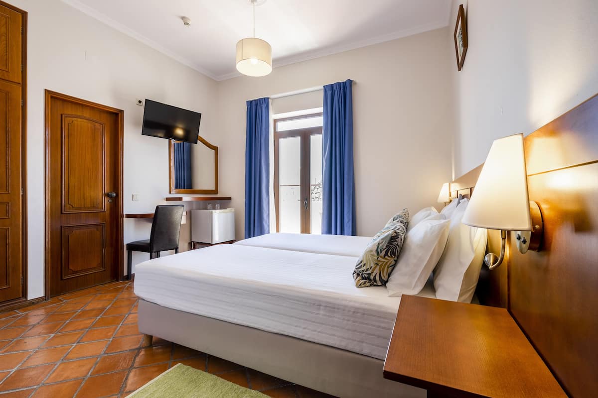 In-room safe, blackout drapes, iron/ironing board (on request)