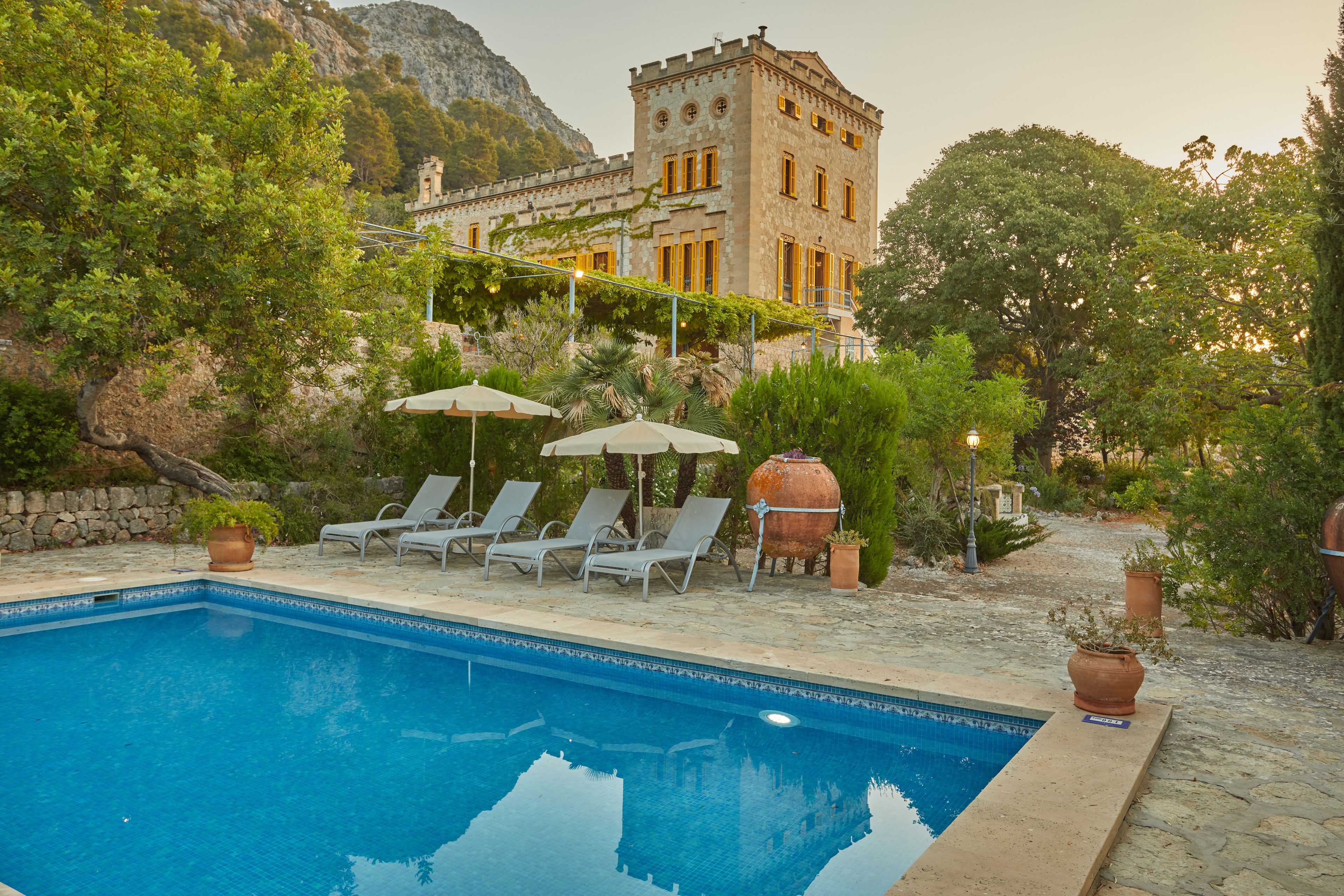 Outdoor pool, open 8:00 AM to 9:00 PM, pool umbrellas, sun loungers