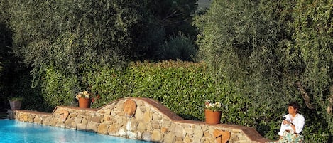 Outdoor pool, pool umbrellas, sun loungers