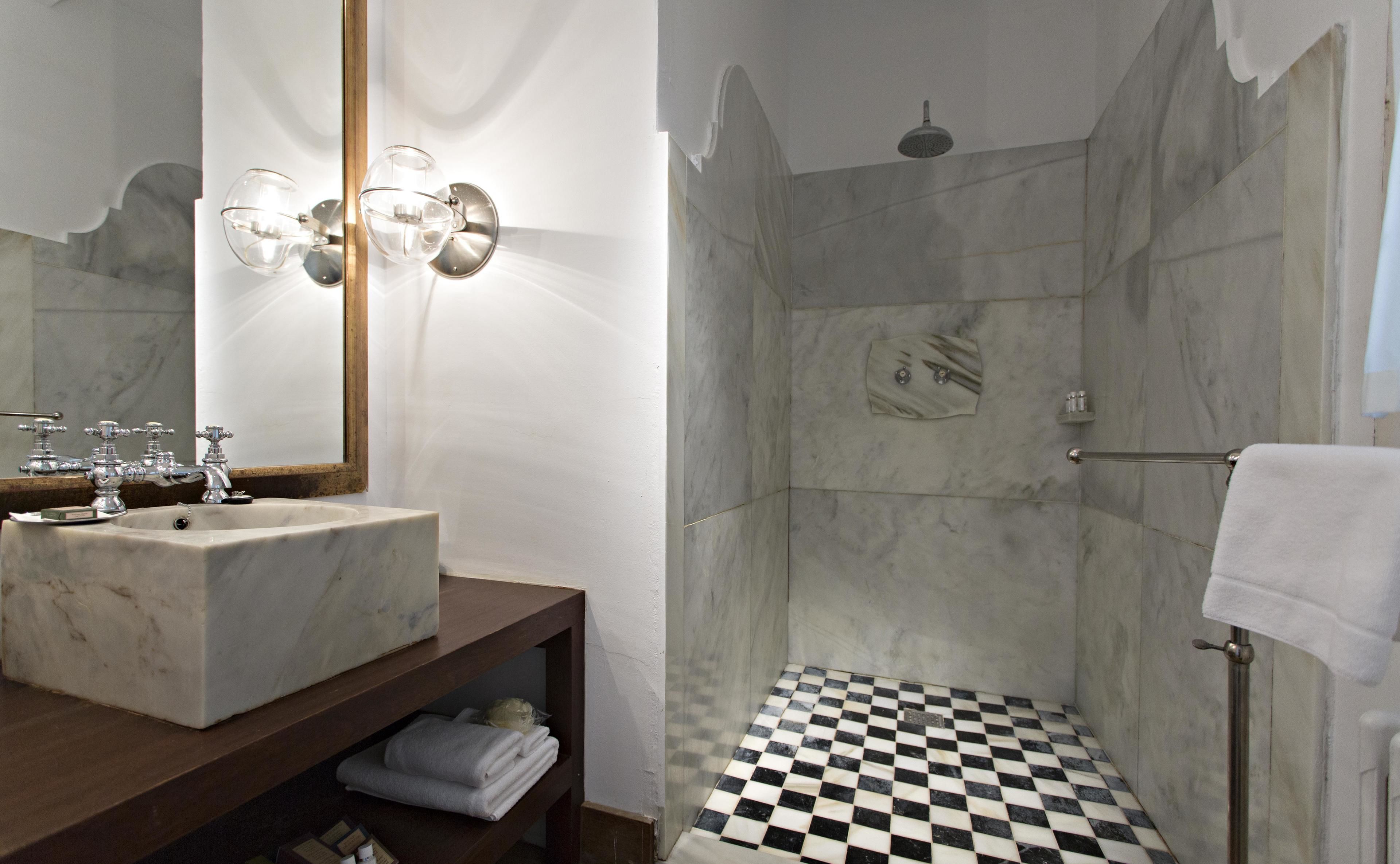 shower, hair dryer, bathrobes, slippers