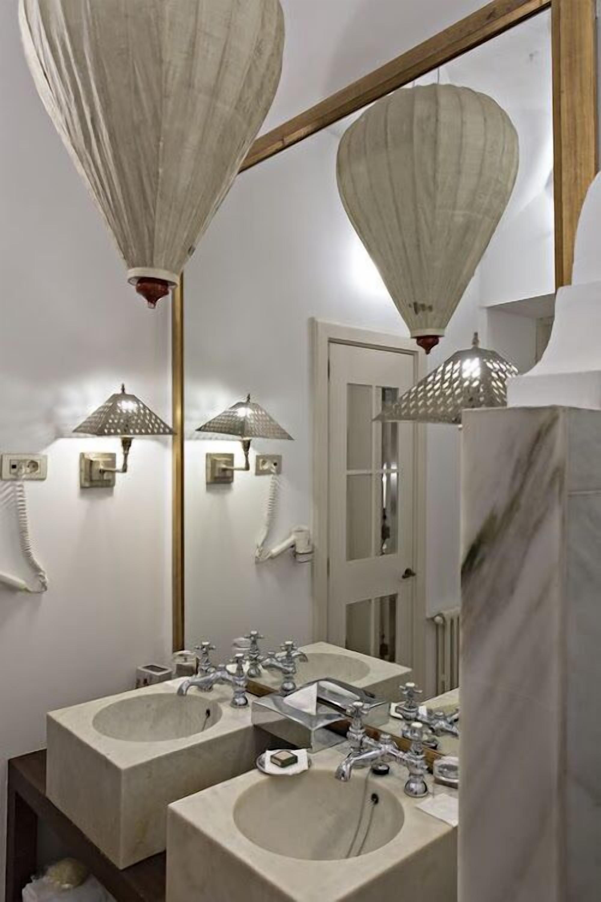 shower, hair dryer, bathrobes, slippers