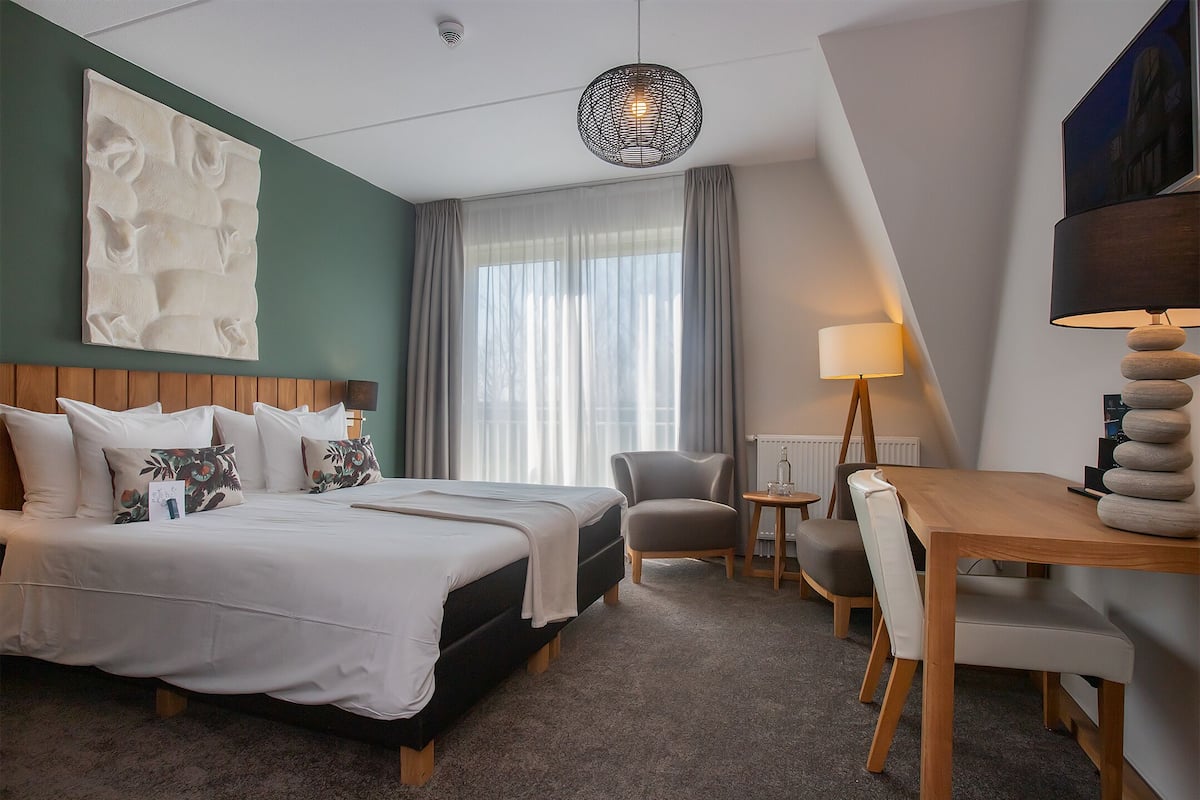 1 habitación y ropa de cama de alta calidad