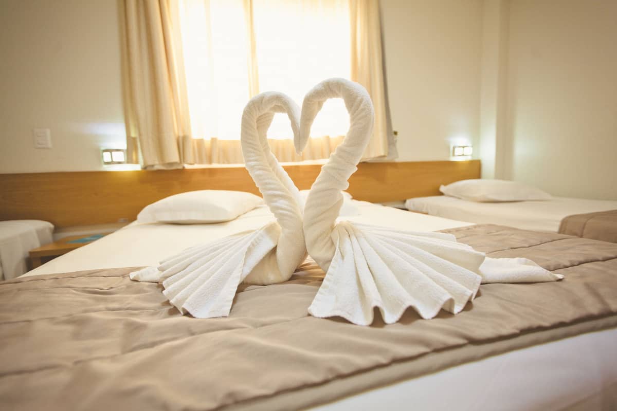 quadruple room, single beds | 1 bedroom, hypo-allergenic bedding, minibar, in-room safe