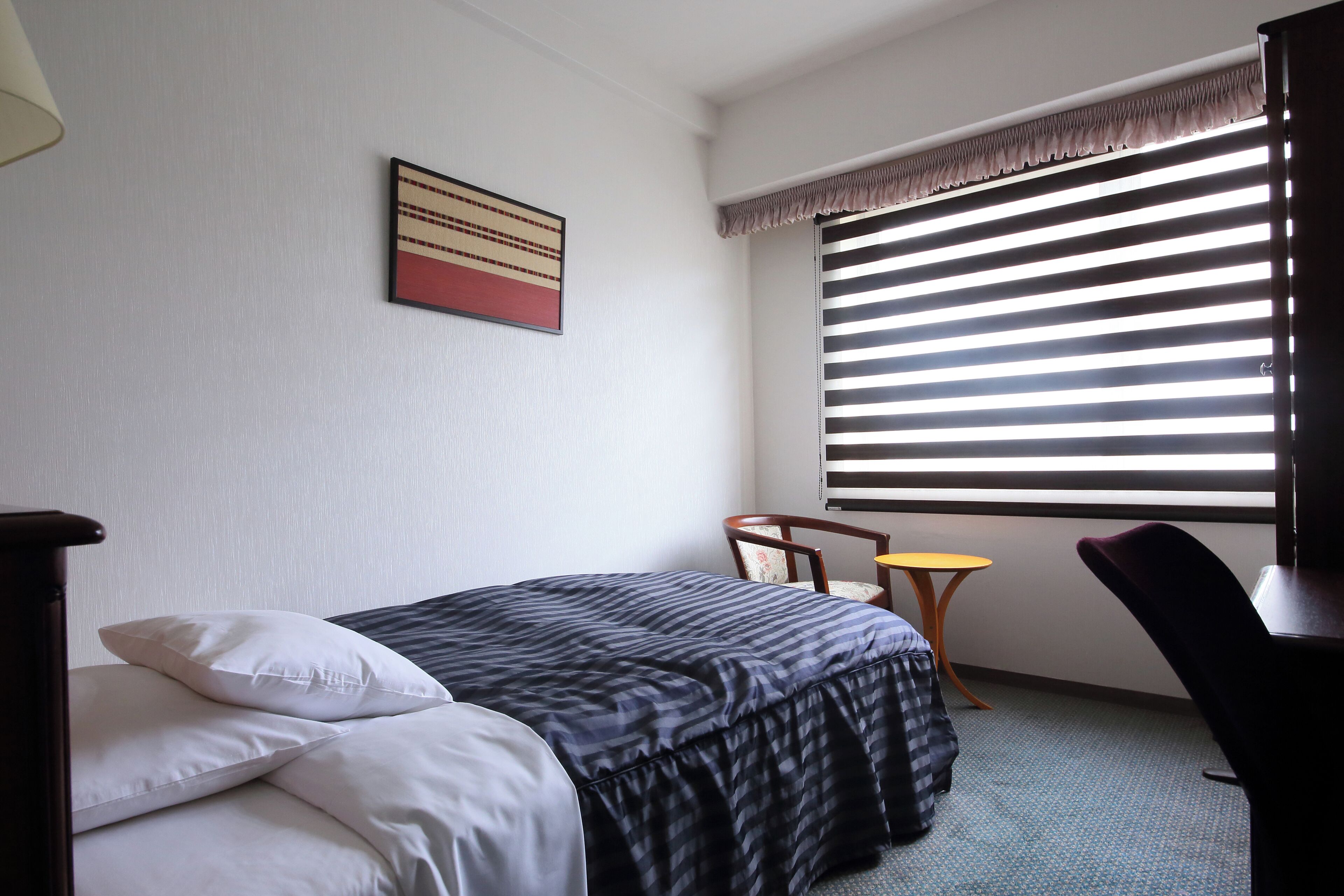 Premium bedding, down comforters, desk, blackout drapes