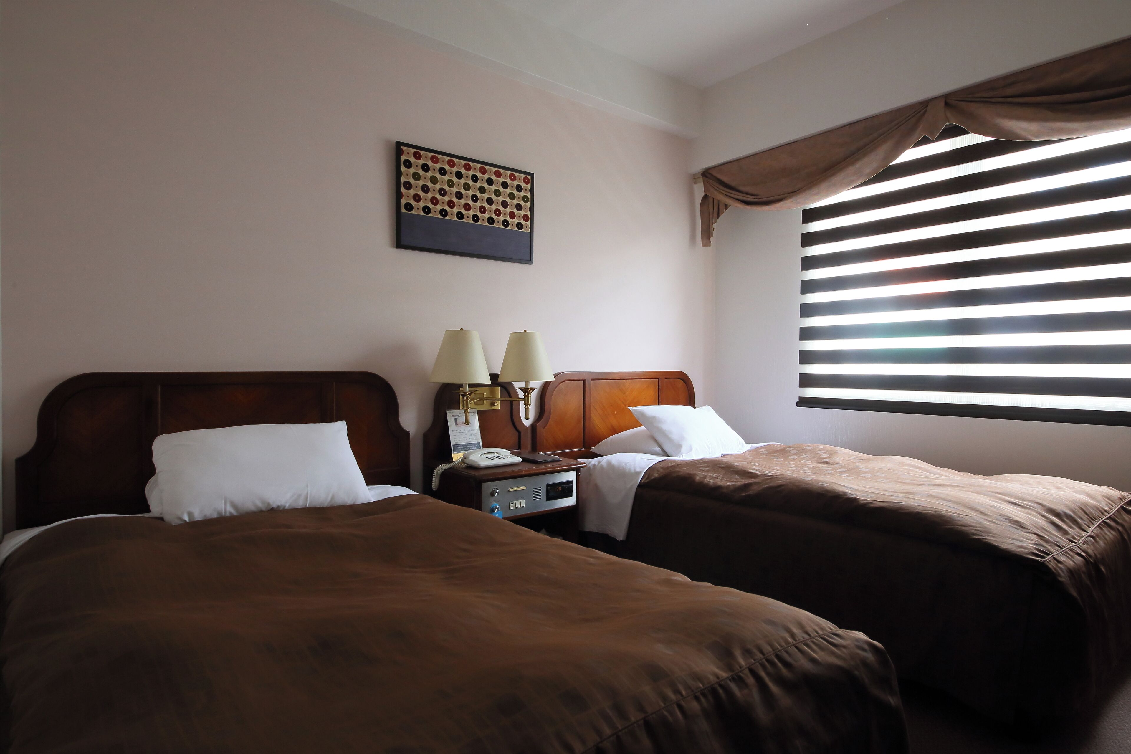 Premium bedding, down comforters, desk, blackout drapes