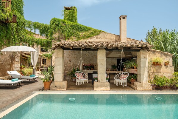 Outdoor pool, pool umbrellas, pool loungers