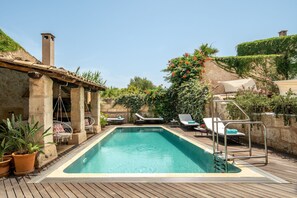 Outdoor pool, pool umbrellas, pool loungers