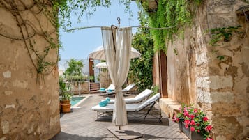 Outdoor pool, pool umbrellas, pool loungers