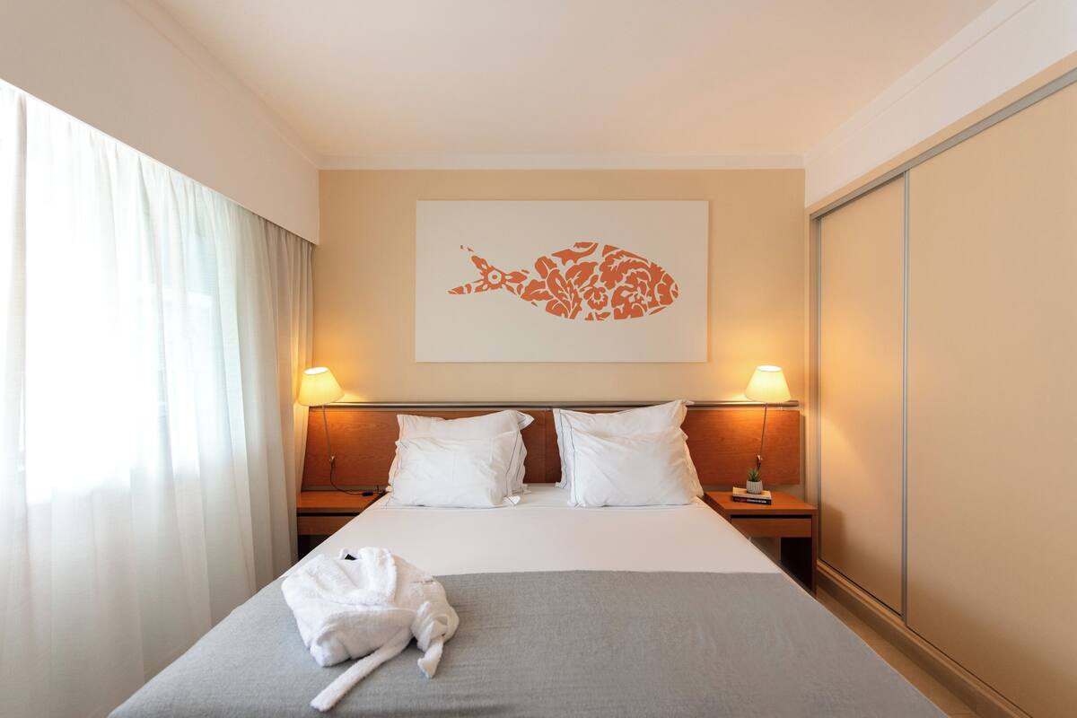 Premium bedding, memory foam beds, in-room safe, desk