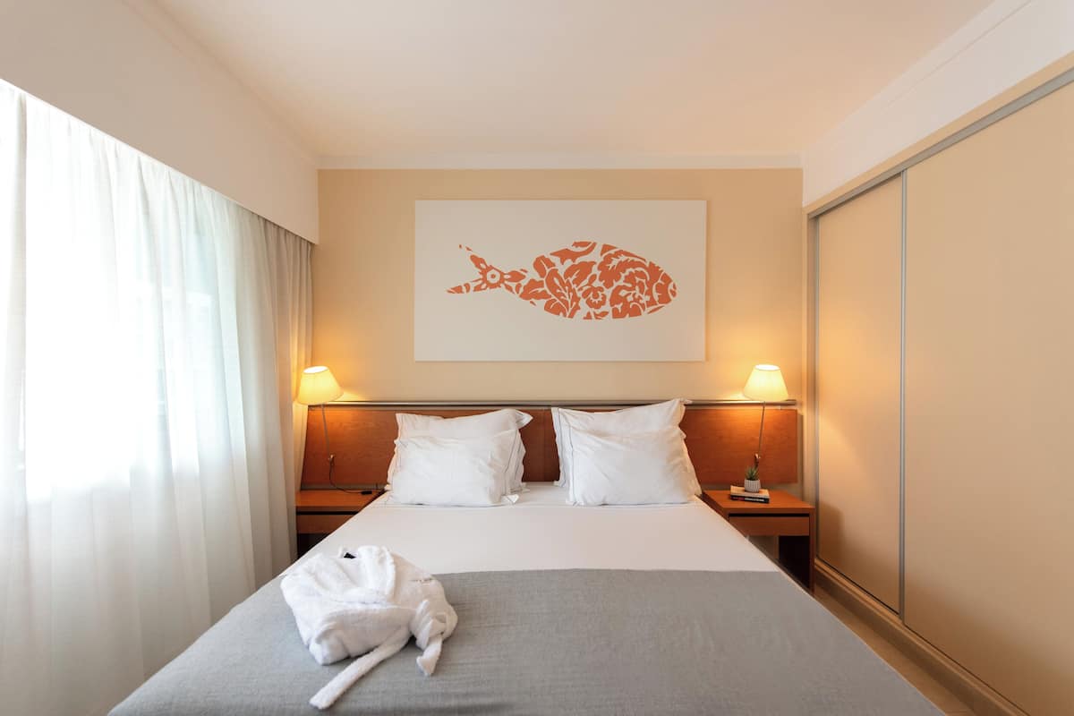 Premium bedding, memory foam beds, in-room safe, desk