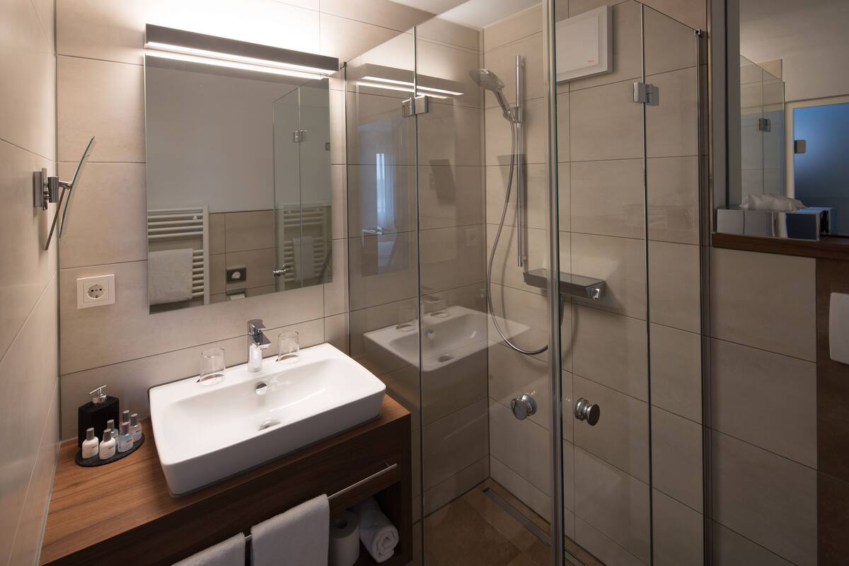 eco-friendly toiletries, hair dryer, towels, soap