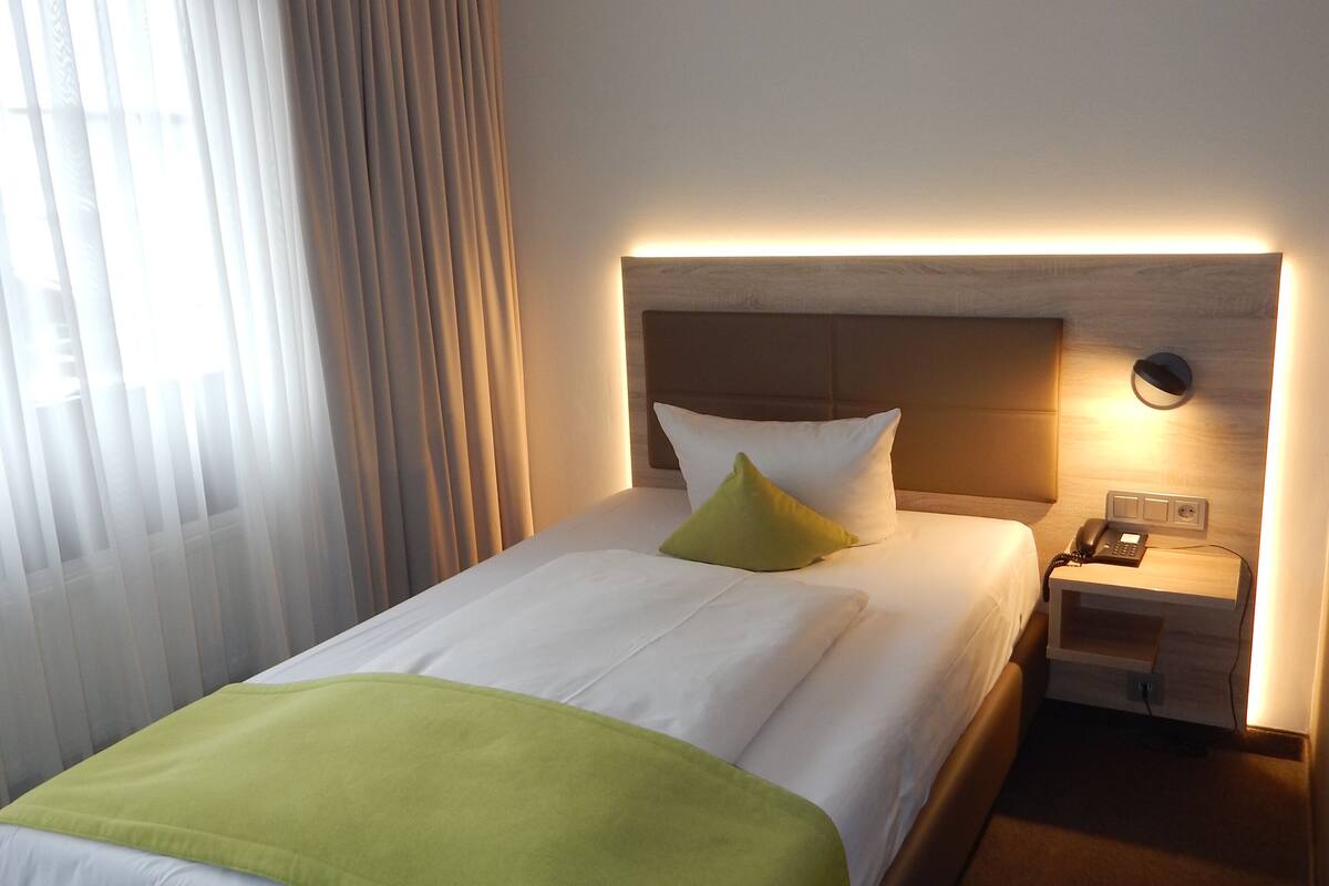 comfort single room | in-room safe, individually decorated, desk, laptop workspace