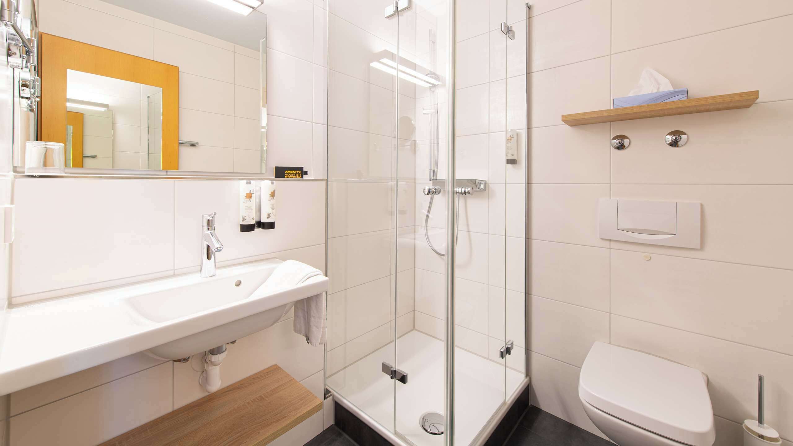 eco-friendly toiletries, hair dryer, towels, soap