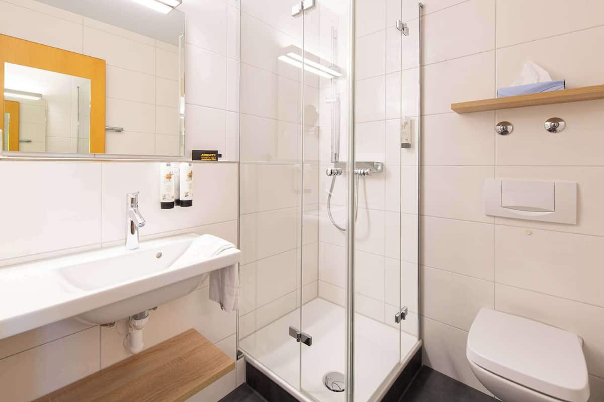 eco-friendly toiletries, hair dryer, towels, soap