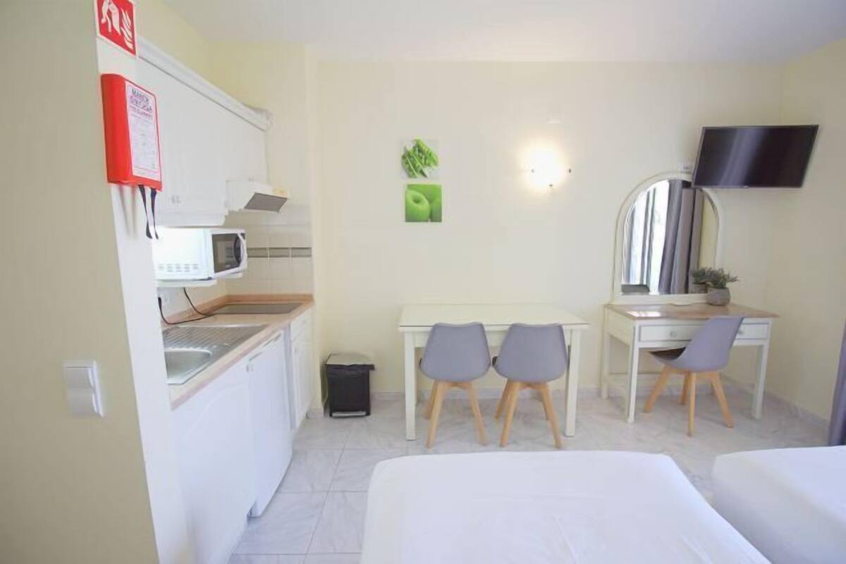 Blackout curtains, iron/ironing board, free WiFi, bed sheets