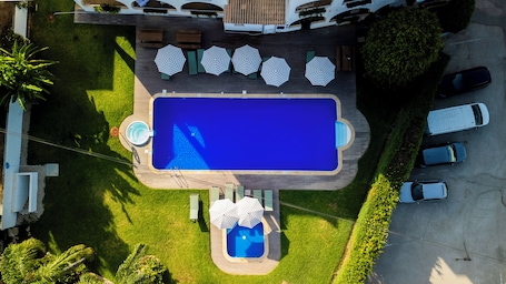 2 outdoor pools, pool umbrellas, sun loungers