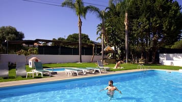 2 outdoor pools, pool umbrellas, pool loungers