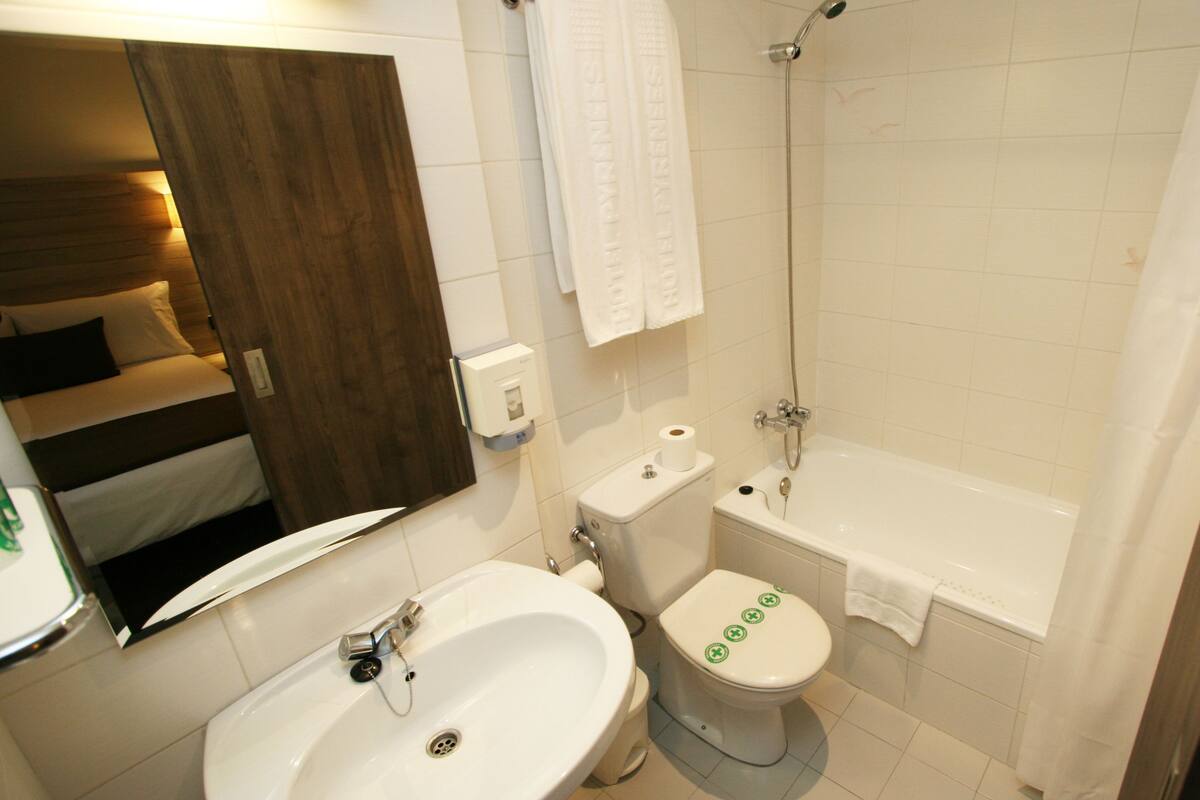 economy double room, 1 double bed | bathroom | hair dryer, towels