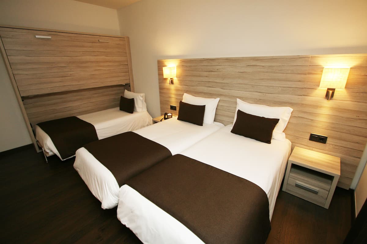 triple room | 1 bedroom, premium bedding, down duvets, in-room safe