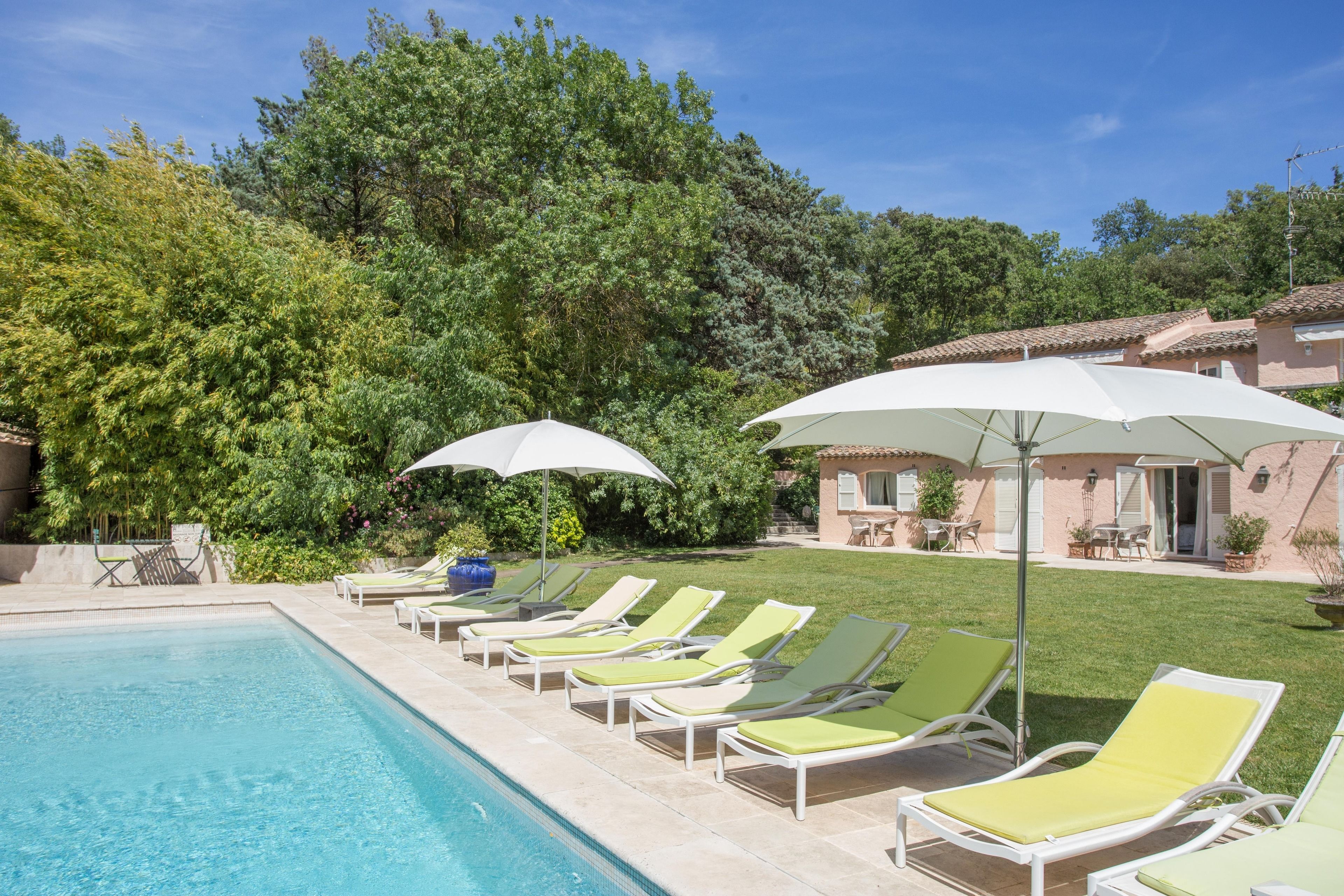 outdoor pool, pool umbrellas, pool loungers