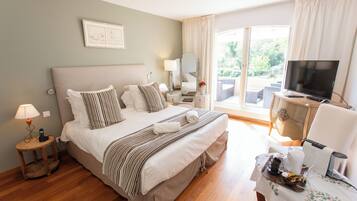 Superior tweepersoonskamer, 1 queensize bed, balkon, uitzicht op tuin | Select Comfort-bedden, een minibar, een kluis op de kamer