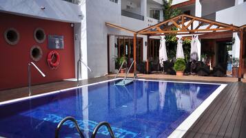 2 outdoor pools, open 10:00 AM to 8:00 PM, pool loungers