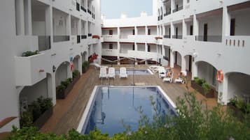 2 outdoor pools, open 10:00 AM to 8:00 PM, pool loungers