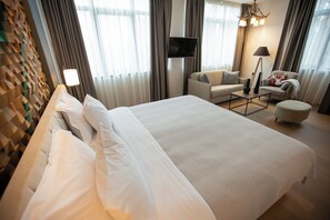 Suite | Seprai premium, bantalan ekstra lembut, minibar, dan brankas