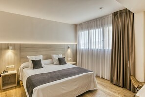 In-room safe, desk, soundproofing, rollaway beds
