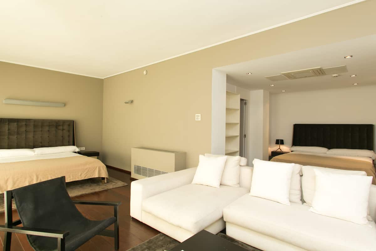 Suite, Poolside | Minibar, in-room safe, iron/ironing board (on request), WiFi (free)