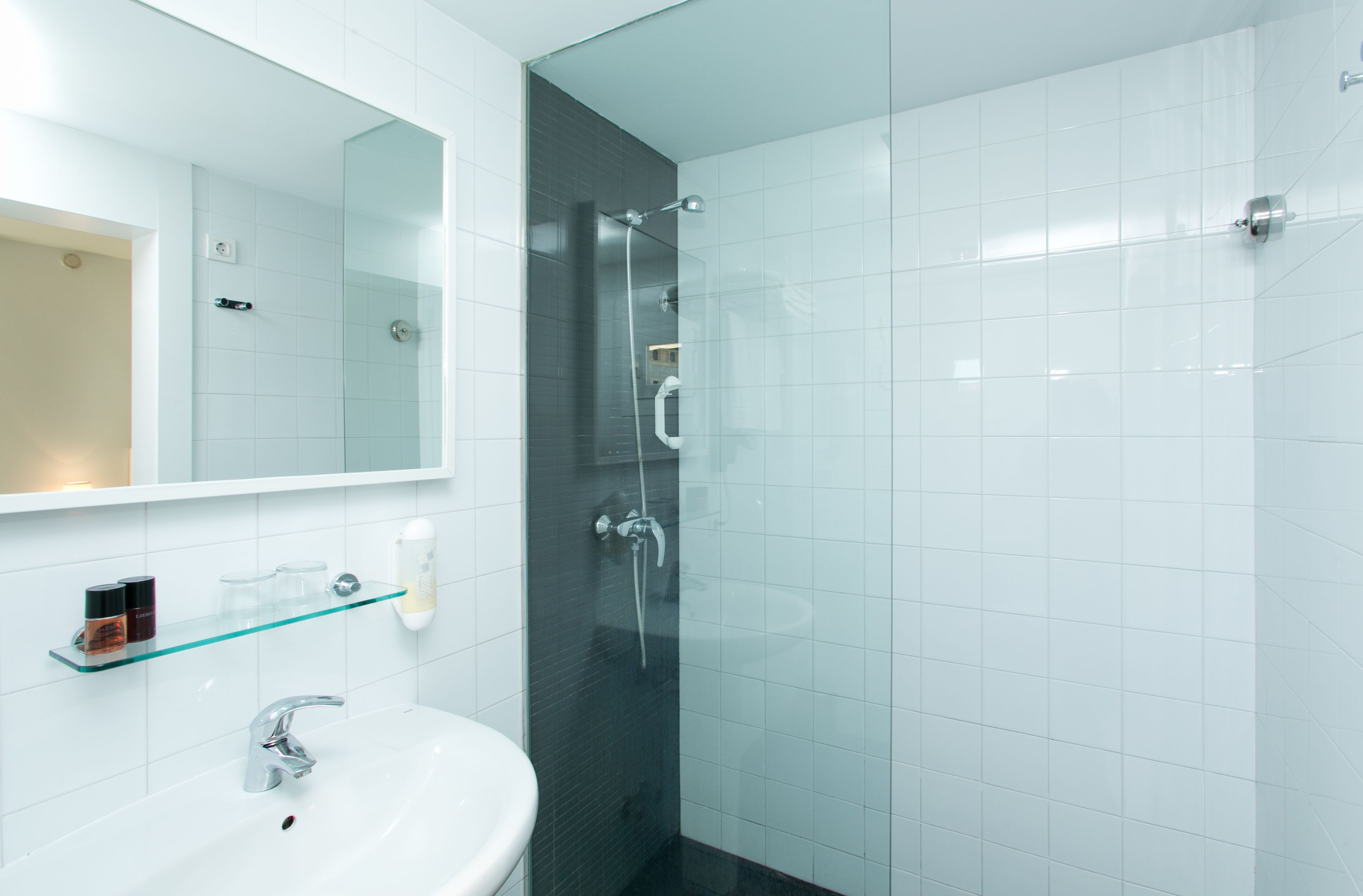 superior double room | bathroom | free toiletries, hair dryer, towels
