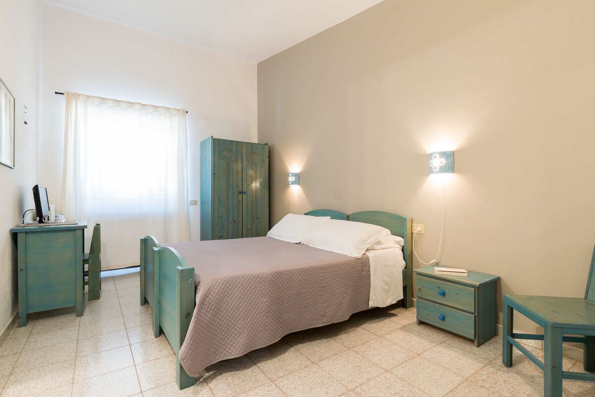 Down comforters, iron/ironing board, WiFi (free), bed sheets