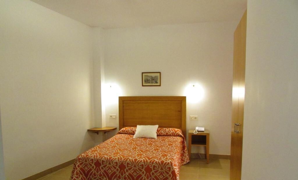 desk, blackout curtains, iron/ironing board, rollaway beds