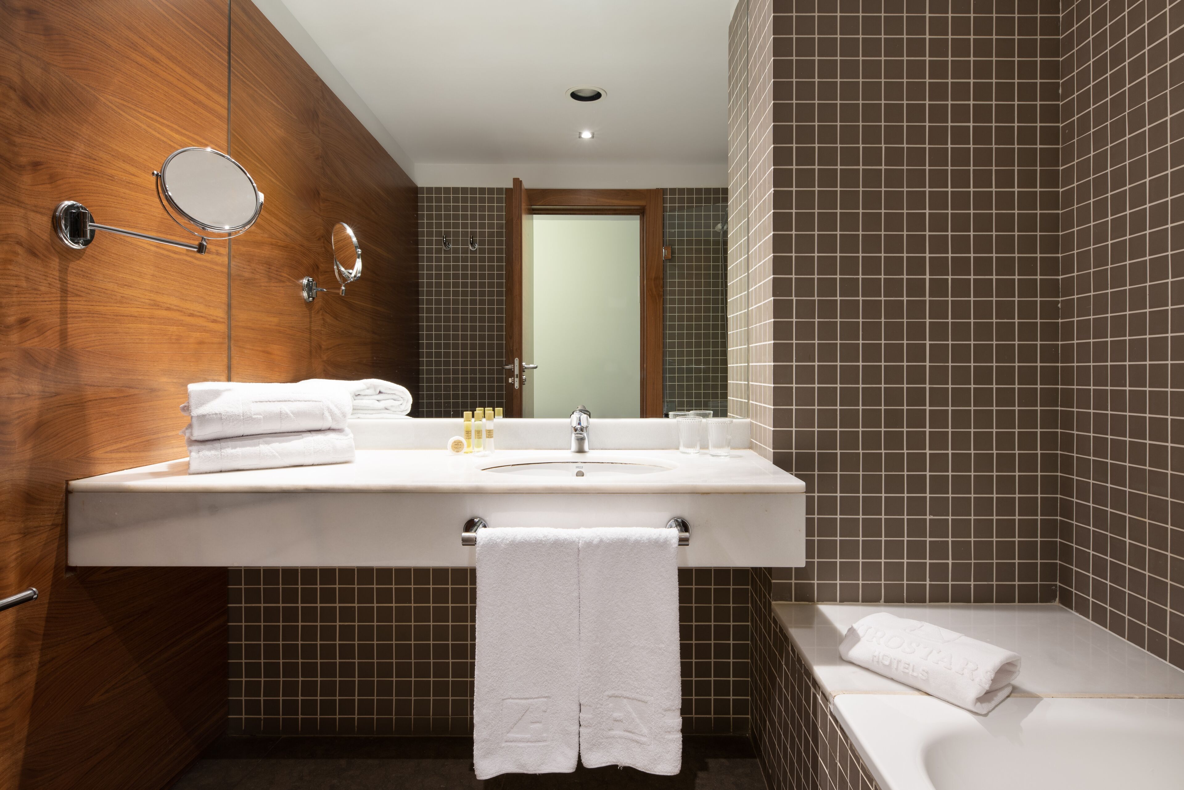standard twin room | bathroom | eco-friendly toiletries, hair dryer, towels