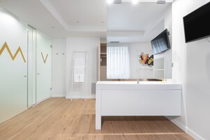 Suite junior | Baño | Artículos de higiene personal ecológicos, secador de pelo y toallas